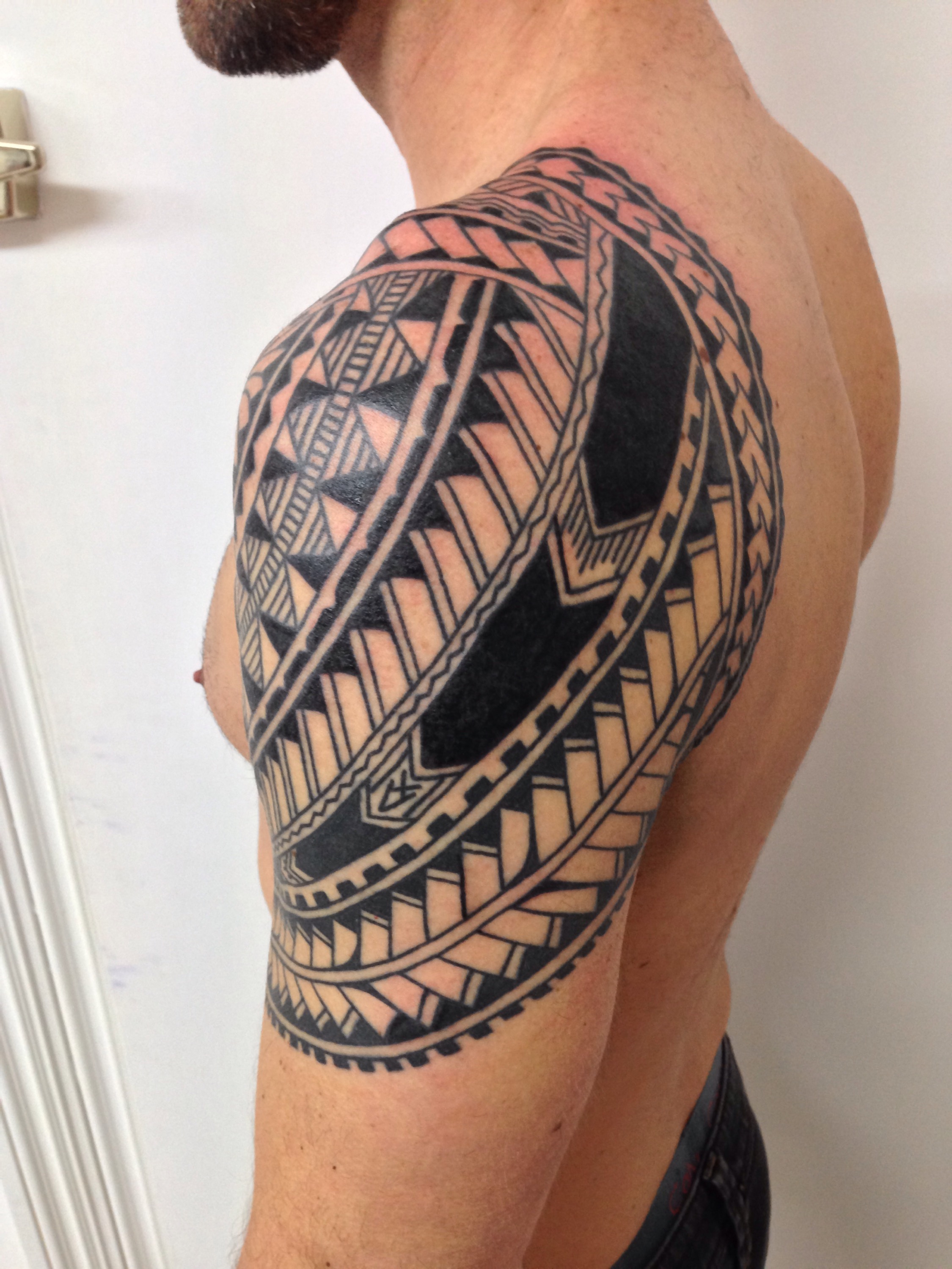 Little Polynesian shoulder tattoo | Higgins Tattoo